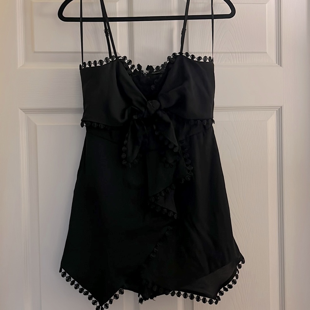 Francesca’s black big bow romper